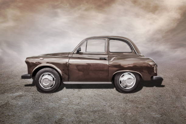 istock old car stands on sepia clouds background 2194847677