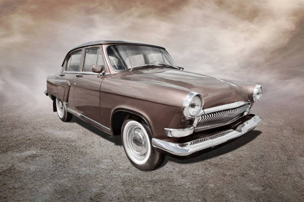istock old car stands on sepia clouds background 2194847681