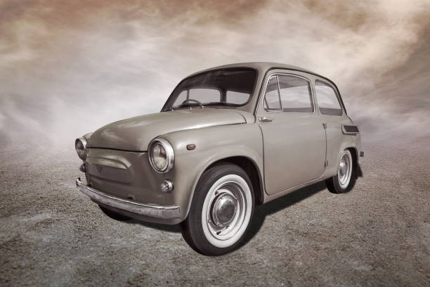 istock old car stands on sepia clouds background 2194847695