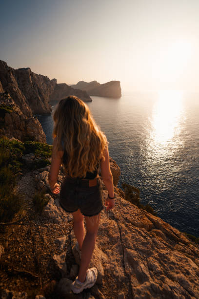 istock Sunlight illuminates the cliffs and waters of Mallorca's coastline at dusk. 2194847781