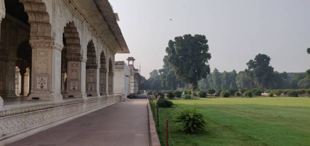 istock A long white building with arches and a courtyard in front of it 2194848250