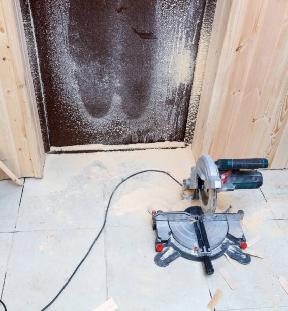 istock A power tool is laying on the floor next to a door 2194850153