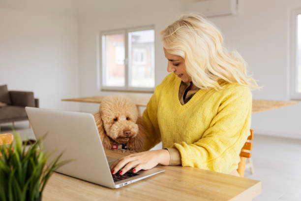 istock Woman and Her Loyal Dog Assistant 2194857777