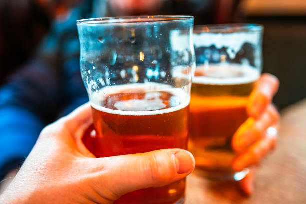 istock Friends celebration toast with pints of beer 2194860273