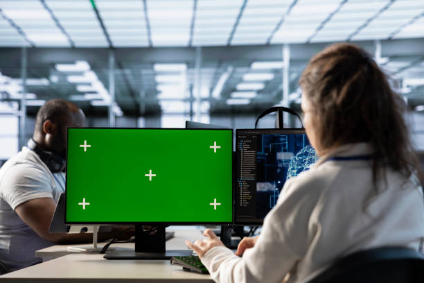 istock Isolated screen PC in front of IT support workers upgrading AI equipment 2194861044