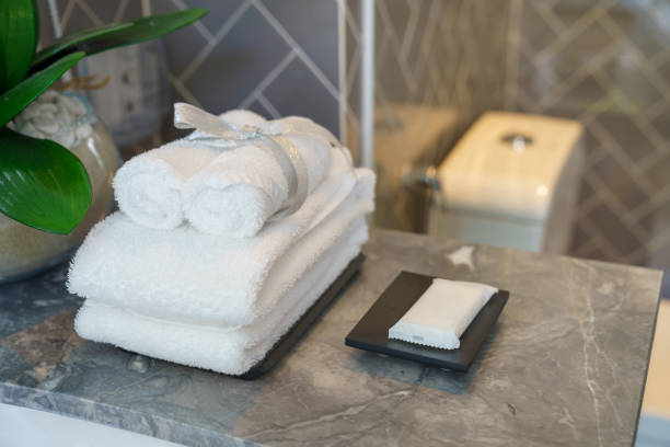 istock White towels and bath accessories in hotel 2194863692