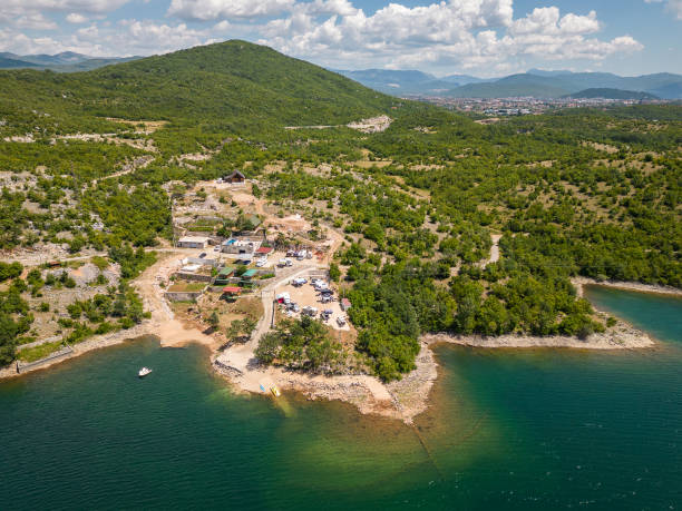 istock Camping site for motorhomes and campervans on lake krupac 2194866778