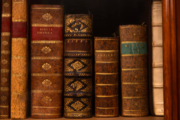 istock Row of vintage bibles with decorative leather bindings 2194867578