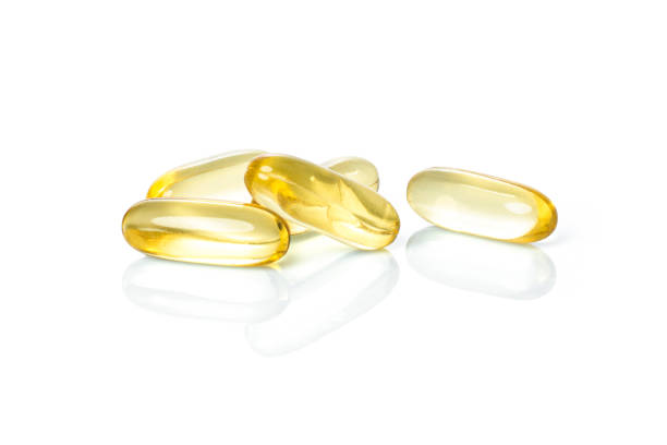istock fish oil capsule, yellow capsule 2194869064
