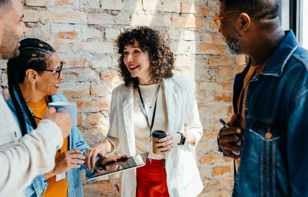 istock Coworkers having a casual meeting during a coffee break 2194870259