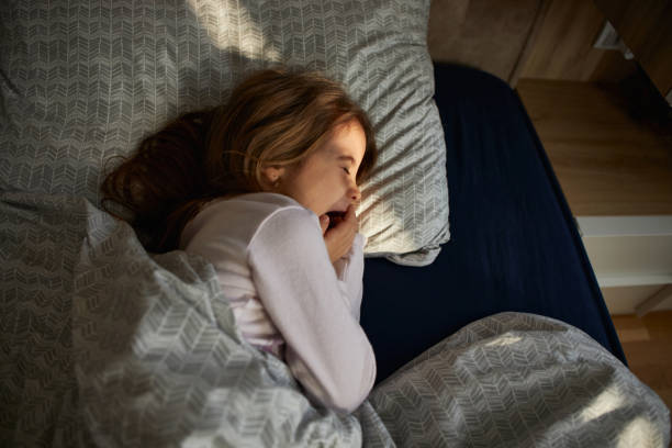 istock Adorable little girl sleeping 2194874622