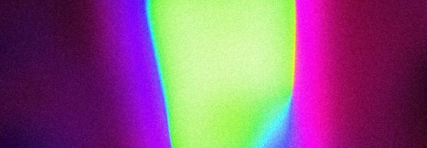 istock Colorful grainy neon purple fluorescent green glowing divided abstract background 2194875841