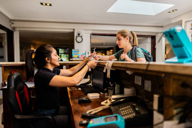 istock Tourist doing check-in on reception hotel 2194878810