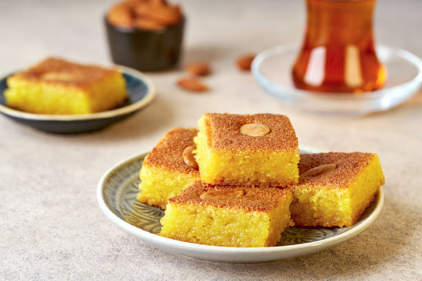 istock Middle eastern traditional semolina cake basbousa , namoora, hareesa served with tea 2194879151