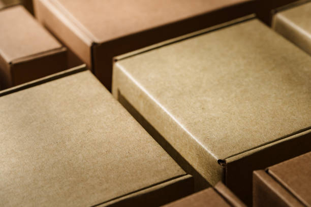 istock Multiple cardboard boxes arranged on a surface for packaging and shipping in a warehouse setting 2194889975