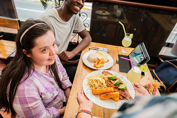 istock Friends talking with waitress on a restaurant 2194891529