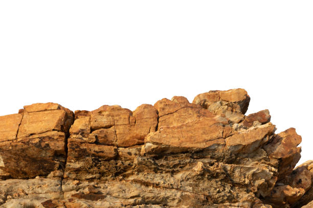 istock A sunlit rock cliff isolated against a white background. 2194893316