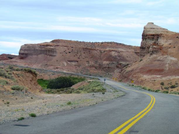istock Beautiful scenery with a winding road through spectacular geological formations on the Wyoming-Montana border. 2194898954