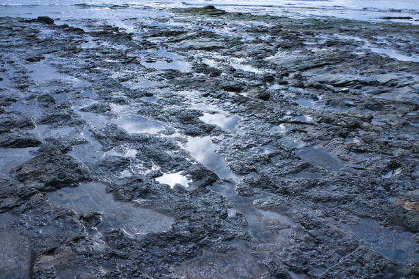 Jagged rock pools and crystal clear blue water