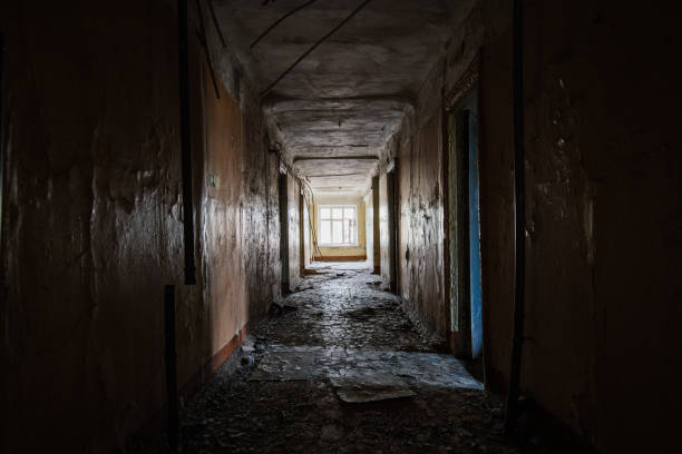 istock Corridor of abandoned apartment building 2194900786