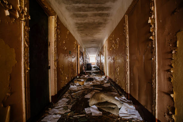 istock Corridor of abandoned apartment building 2194900880