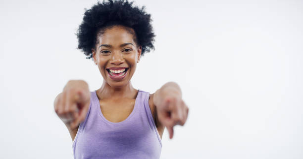 istock Exercise, pointing and portrait with woman personal trainer in studio on white background for decision or vote. Fitness, smile and training with gym coach choosing you for membership or recruitment 2194906442