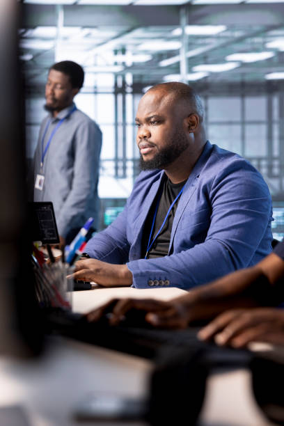 istock System administrator in data center protecting company critical infrastructure 2194913269
