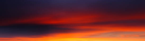 istock Afterglow in panoramic sky with smooth clouds, with surreal beauty 2194914765