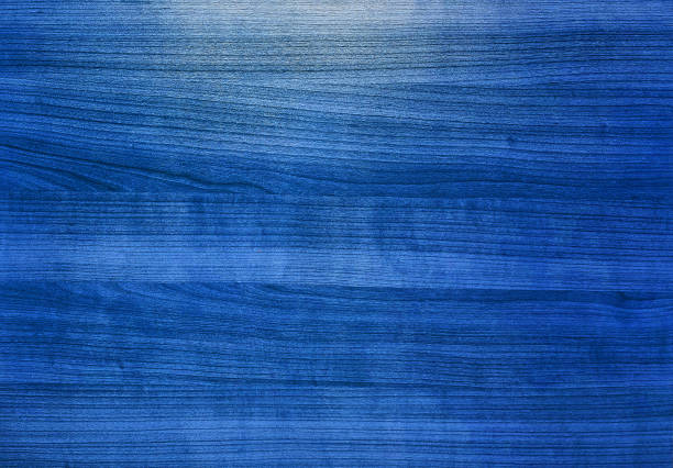 abstract blue wood grain texture background, matte surface. oak wooden laminate background with blank space for design.