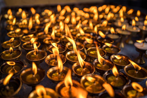 istock Burning earthen lamps around the Swayambhunath Stupa, Nepal. 2194917460