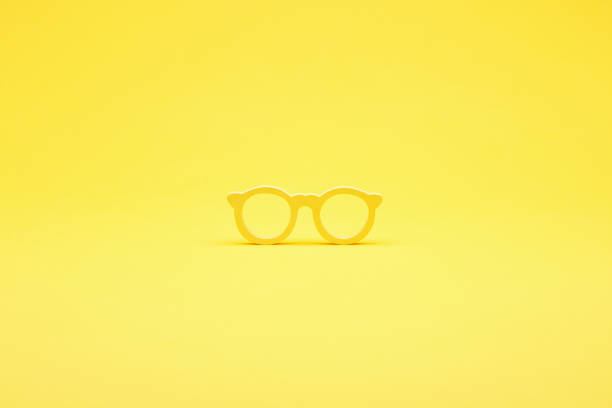 istock Yellow wooden eyeglasses frame 2194917934
