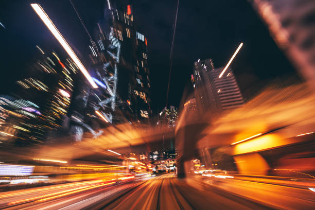 istock Dynamic Nighttime Cityscape with Motion Blur Capturing Urban Energy 2194917954
