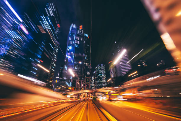 Dynamic Urban Cityscape at Night in Hong Kong Capturing Motion and Energy stock photo