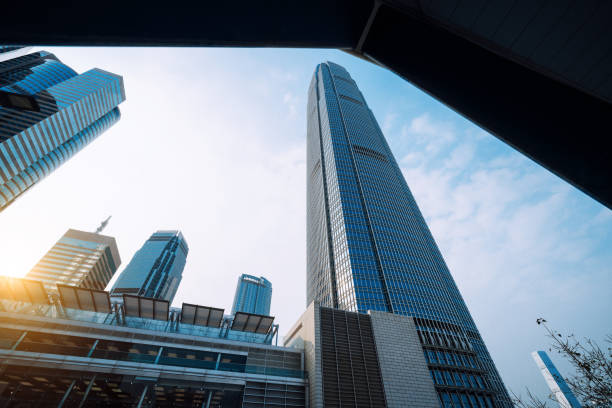 istock Modern Skyscrapers in Hong Kong Against a Bright Blue Sky 2194918201
