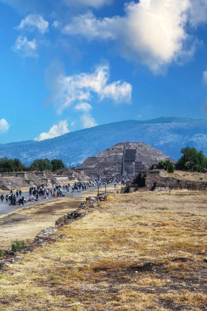 San Juan Teotihuacan, Mexico - September 16, 2022: Teotihuacan Pyramids Botanical Gardens in the daytime, tourists climb the steps.
