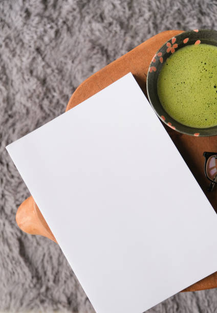 istock blank magazine mockup on coffee table with green matcha tea 2194923439