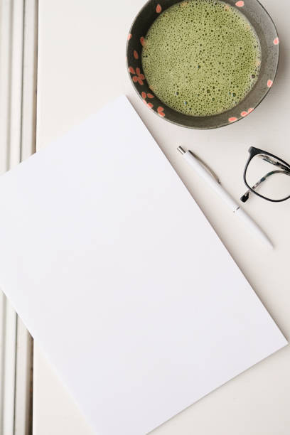 istock blank magazine mockup on coffee table with green matcha tea near window 2194924291