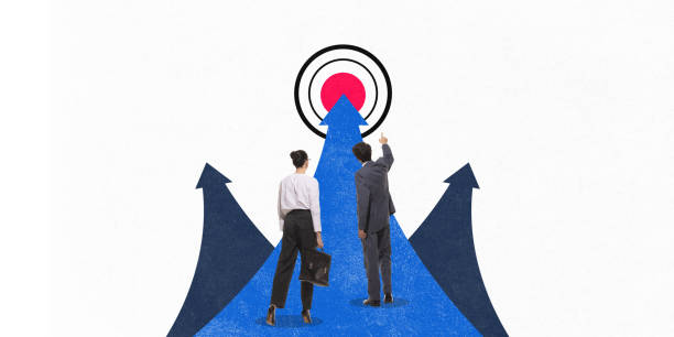 istock Employees standing on split blue arrows pointing towards central red target, symbolizing strategy and unified vision. Conceptual design 2194924451