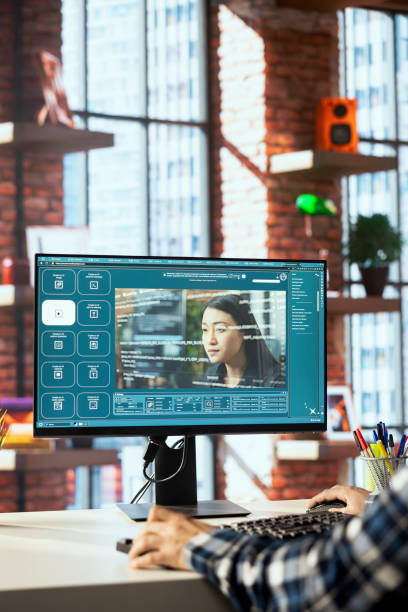 istock IT employee in home office using neural network tech to build text to image AI 2194933831