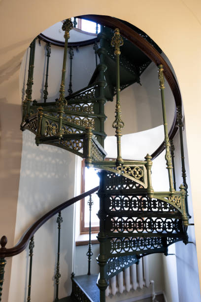 istock Spiral staircase made of cast iron, classic architecture 2194936199