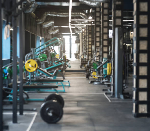 istock Modern Gym Interior With Workout Equipment During Early Morning Hours 2194936901