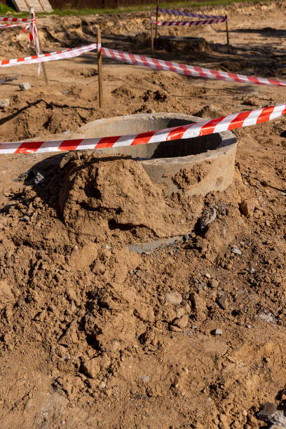 istock hole in the ground on the site of which a highway was started 2194937788
