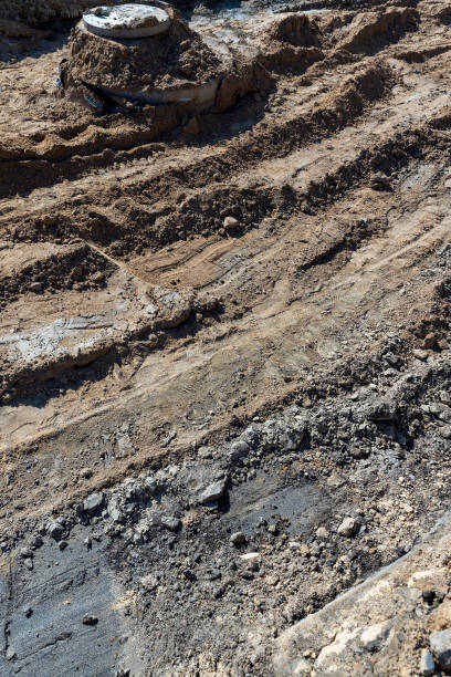 istock hole in the ground on the site of which a highway was started 2194937970