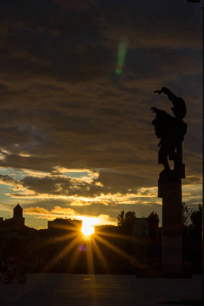 istock Black shadow of the firefighters monument at sunset 2194938587