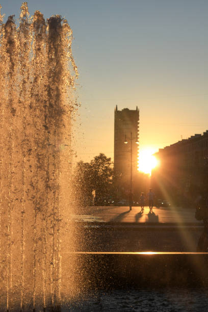 istock Fountain in the orange sunset 2194938619