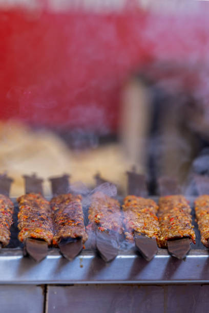 istock cooking Turkish adana kebab on grill 2194944055