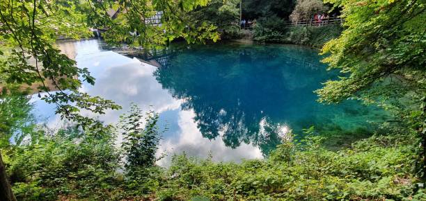istock Blautopf in Ulm showing its beatiful blue spring water 2194945253
