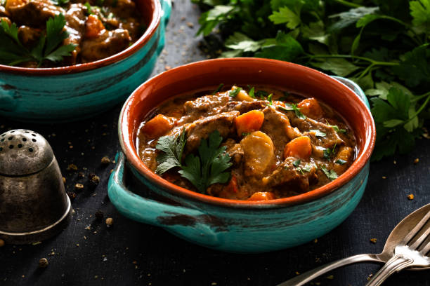 istock Beef goulash with vegetables on black table 2194945383