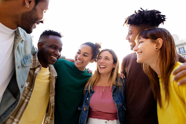 istock Young group of multiracial people having fun outside. 2194946783