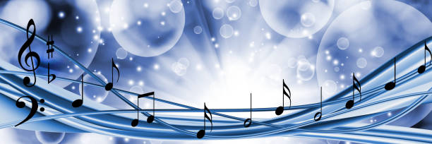 istock Melodies dancing through a serene blue landscape filled with musical notes and soft illuminated bubbles 2194951781